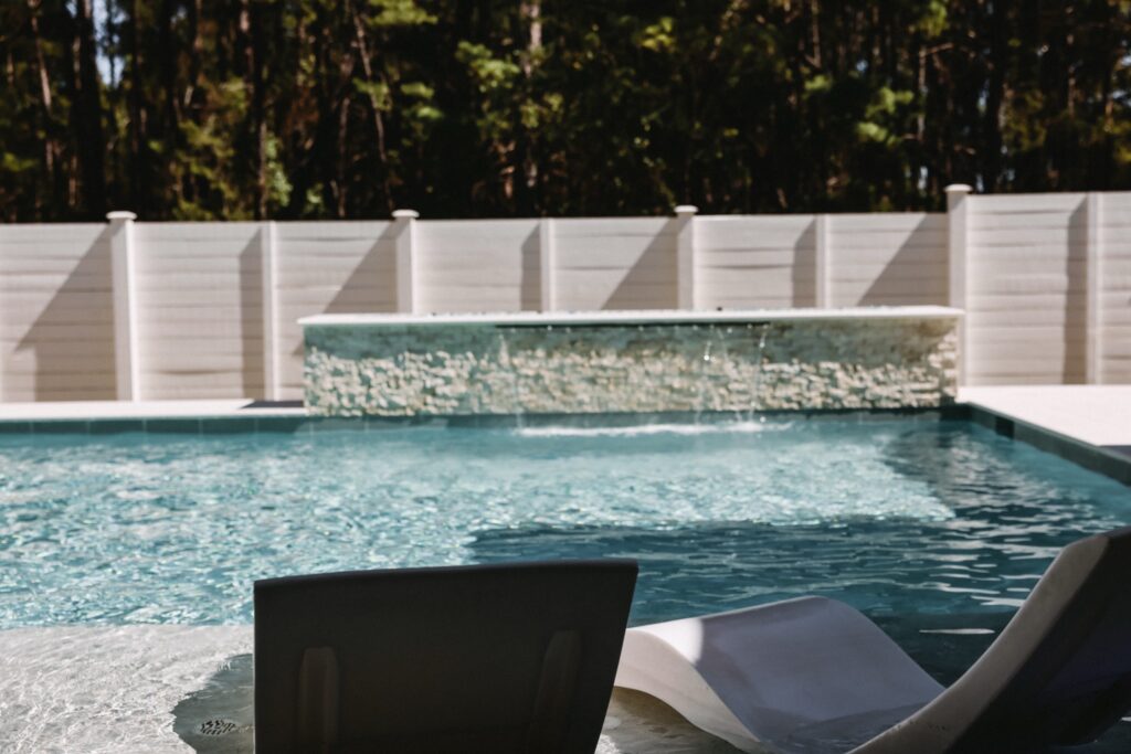 Premium pool water and lounge setting ready for guests